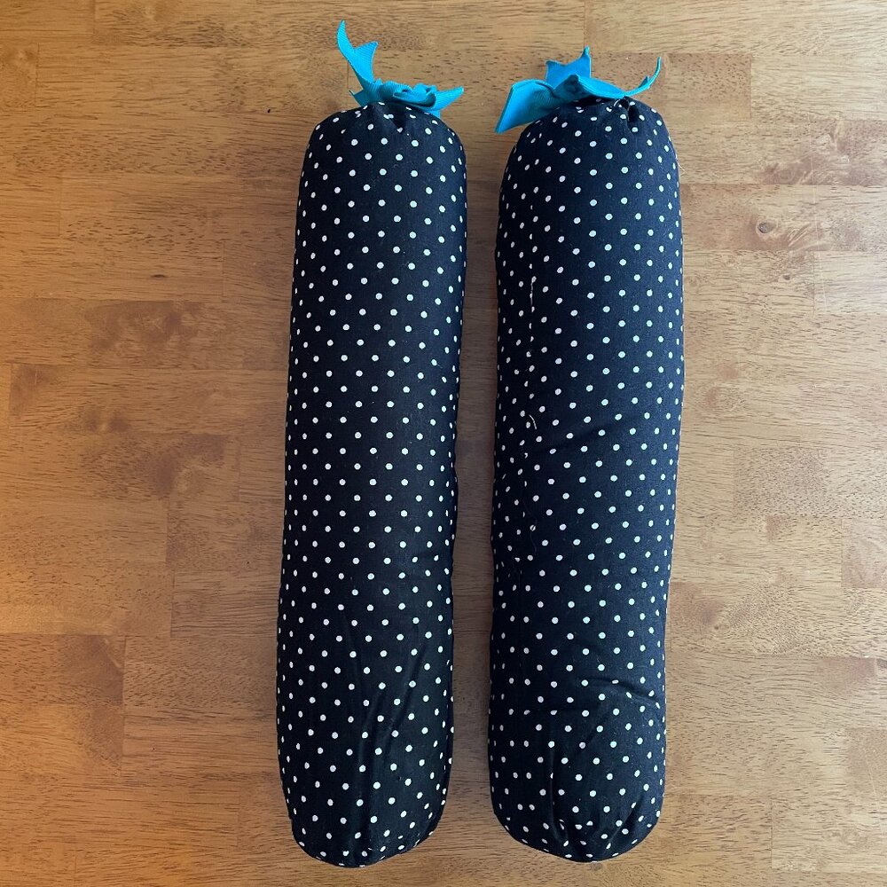 One set black and white polka dot boot shapers with turquoise bow